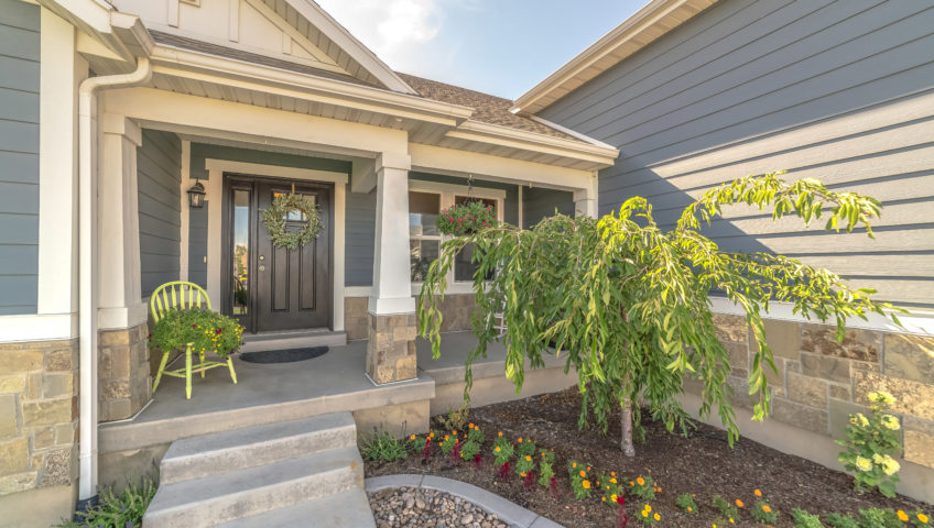 home with plants on front porch